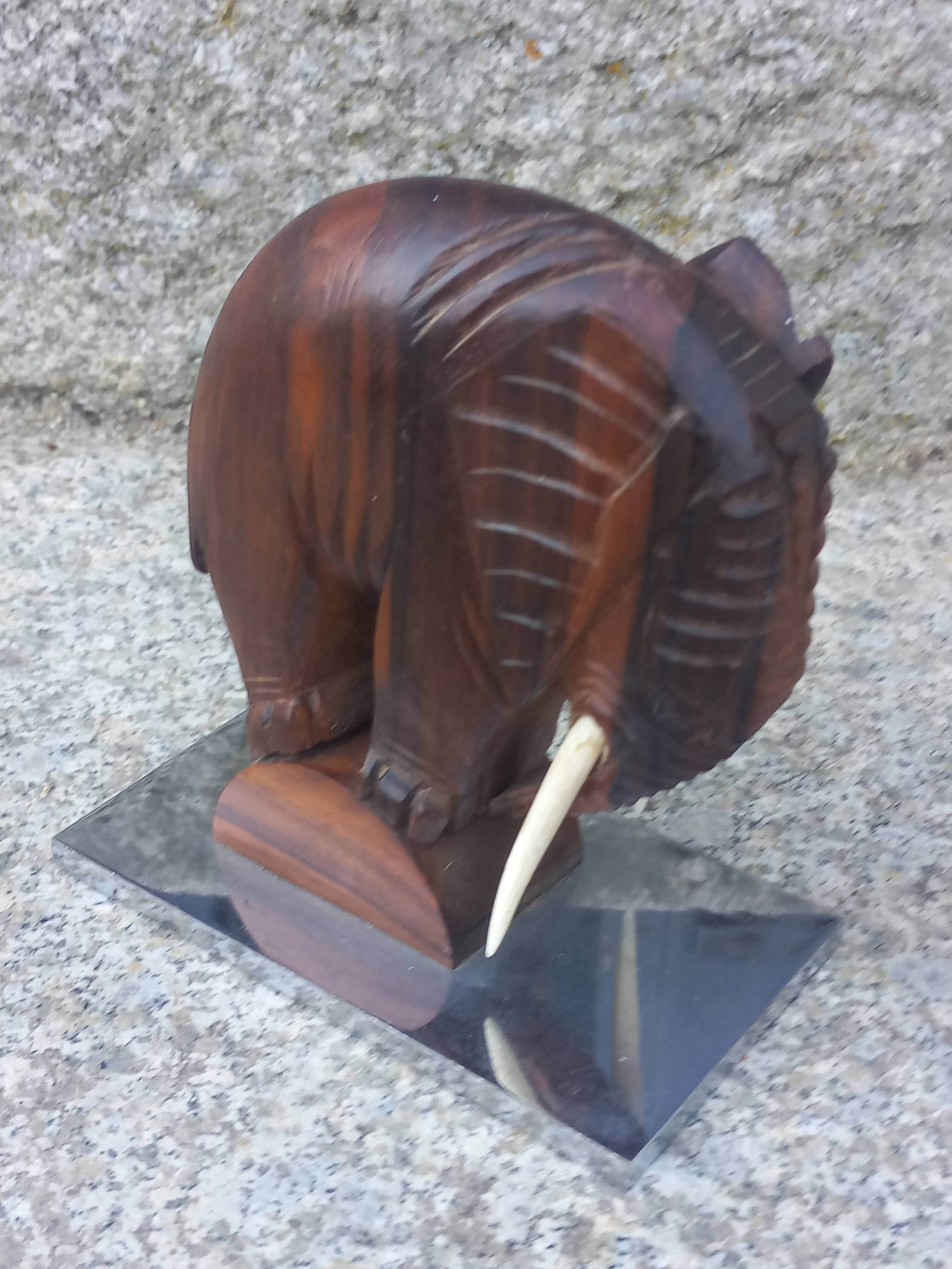 Pair of Art Deco elephant bookends in rosewood with chrome base.
