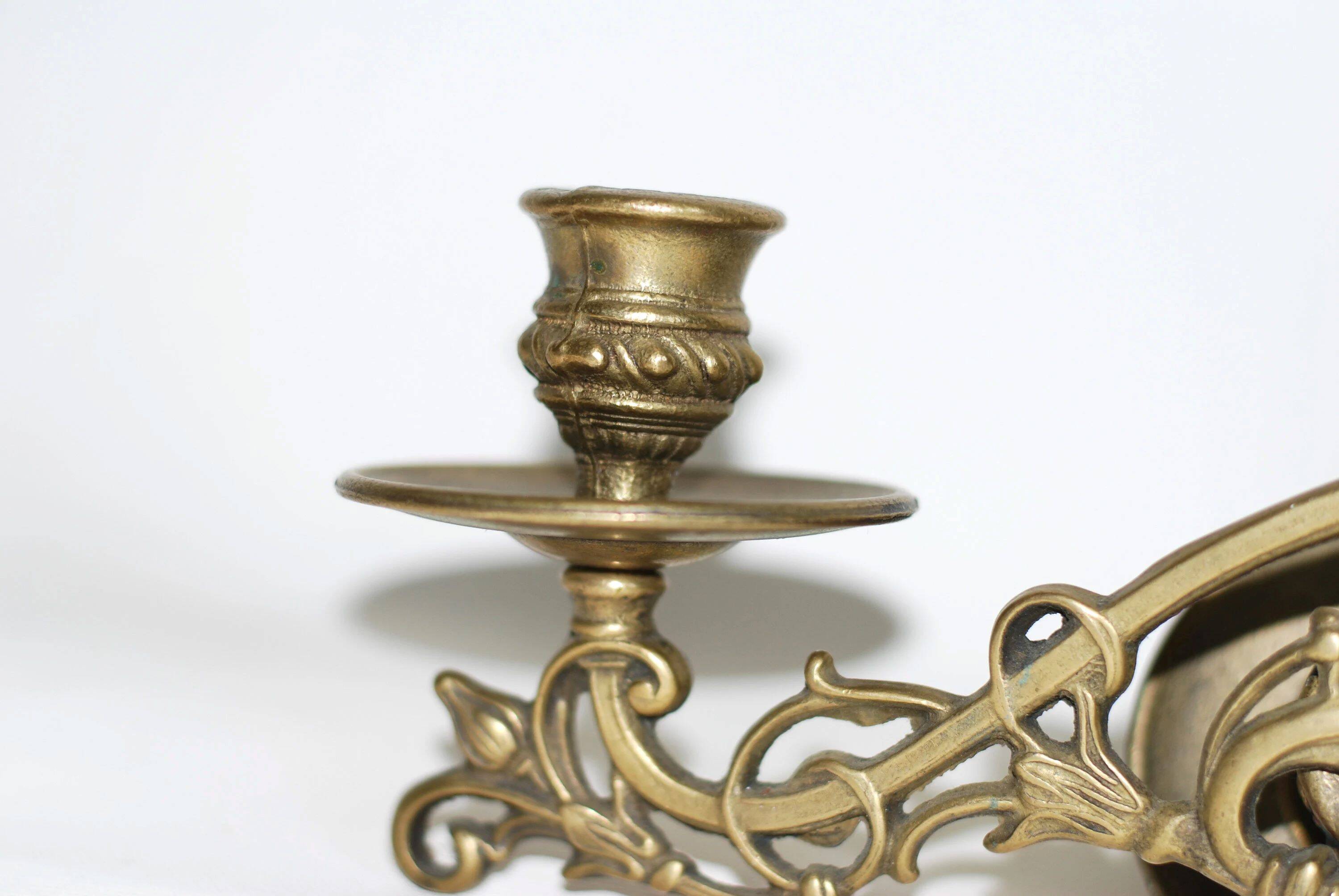 Pair of wall candle holders in brass