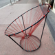 Red rope "cockroach" chair