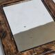 Antique Louis-Philippe mirror, rounded corners, imitation wood, 30 x 37 cm
