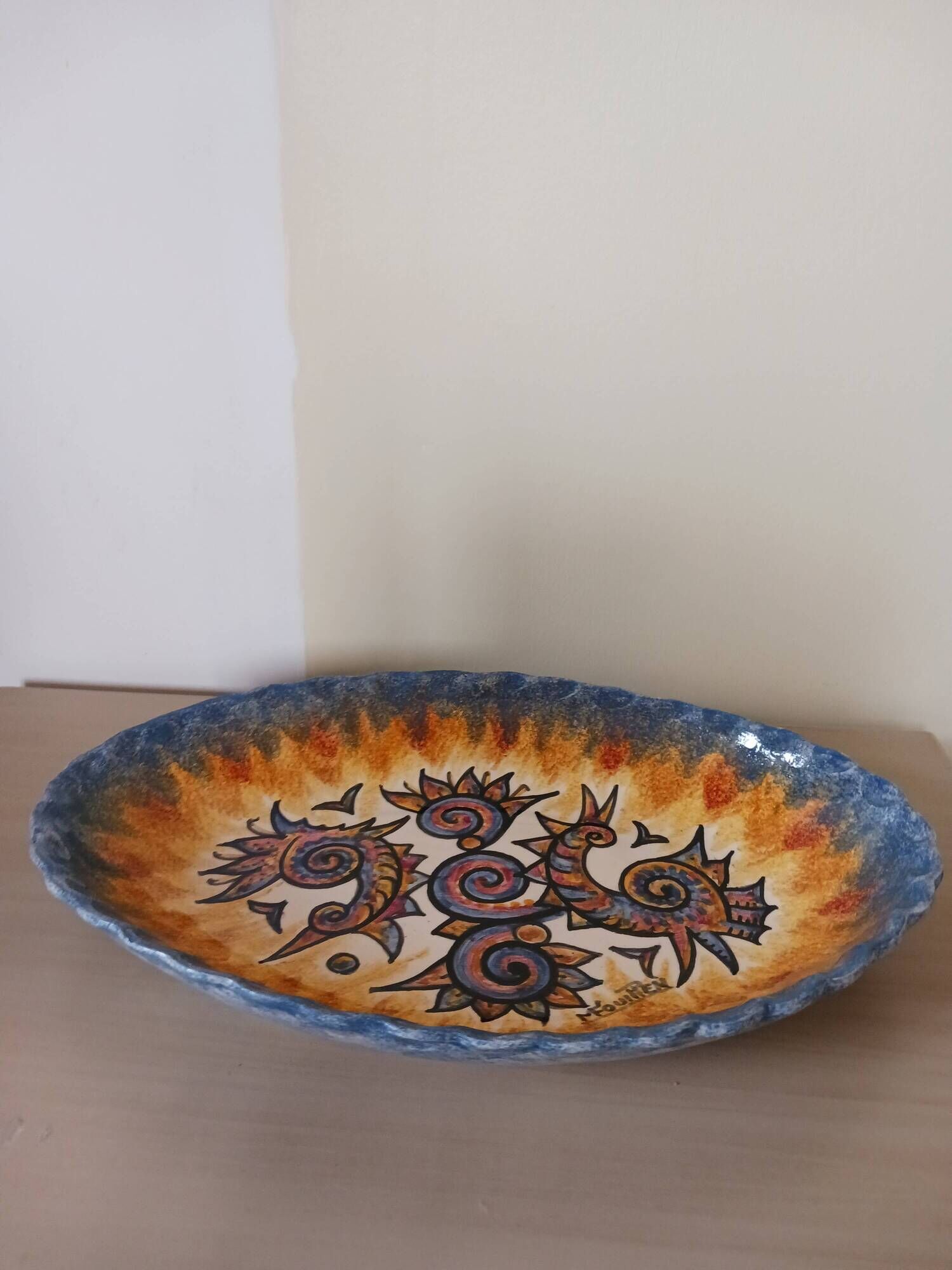 Earthenware plate by Paul Fouillen.