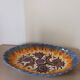 Earthenware plate by Paul Fouillen.