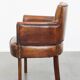 Amazing cognac-coloured sheepskin dining/side chair with armrests