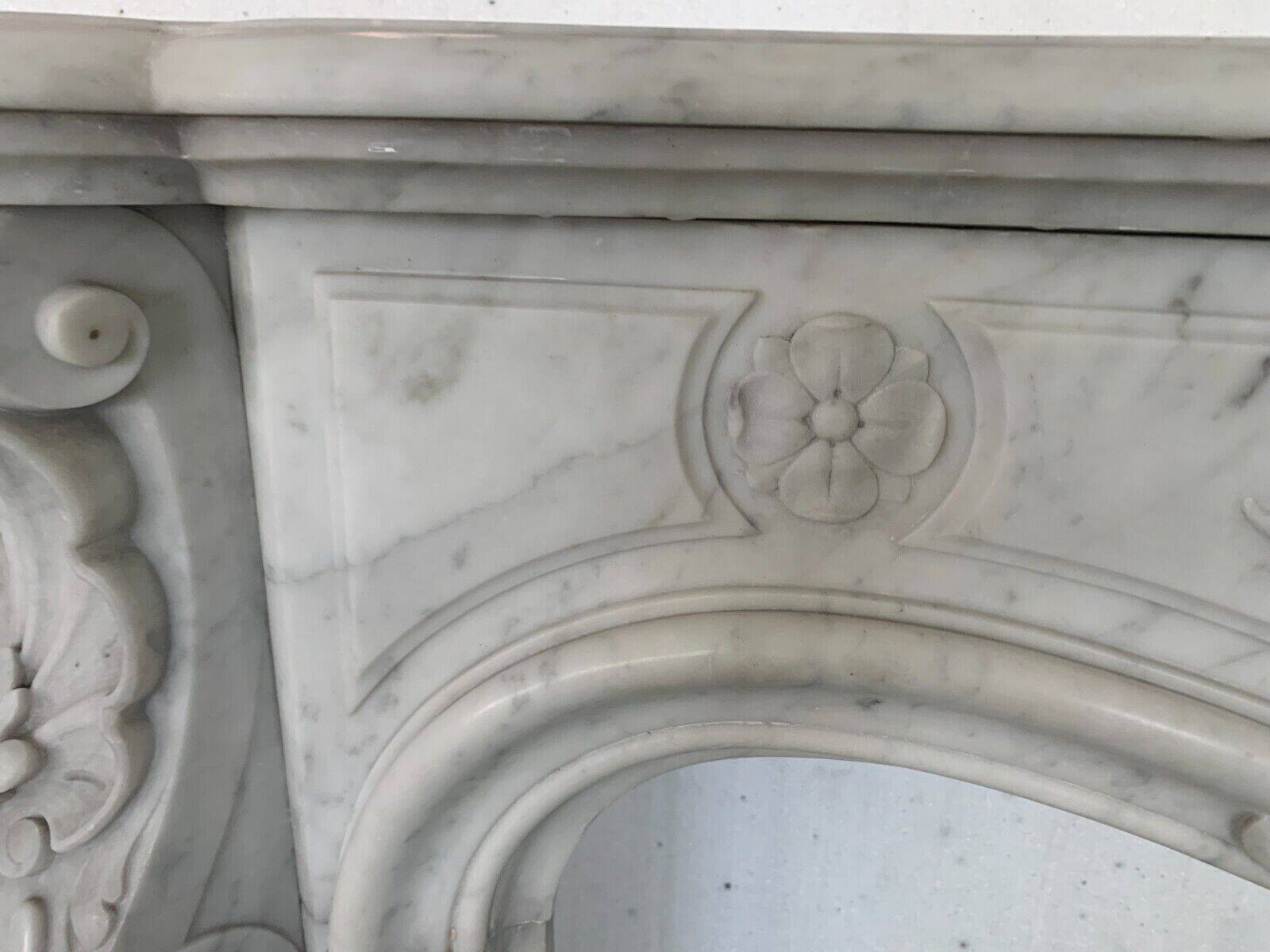 Louis XV style fireplace in white Carrara marble 19th century