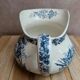 Small chubby antique jug in ironstone – blue floral decoration