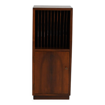 Cabinet with vinyl storage compartment