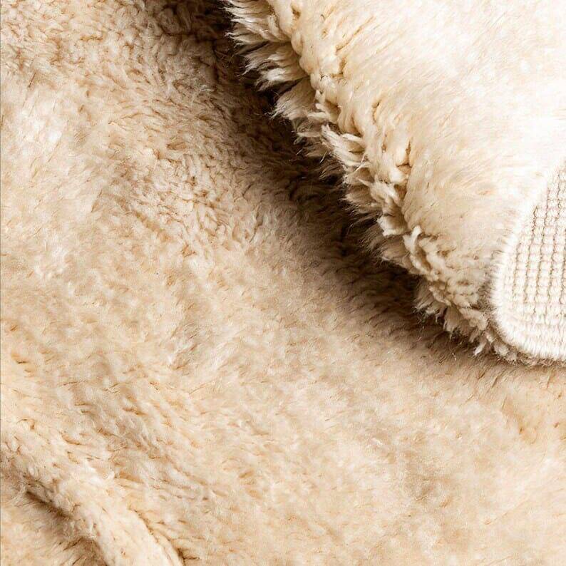 Tapis rond en laine naturelle artisanale