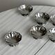 Set of 6 low bowls in polished stainless steel