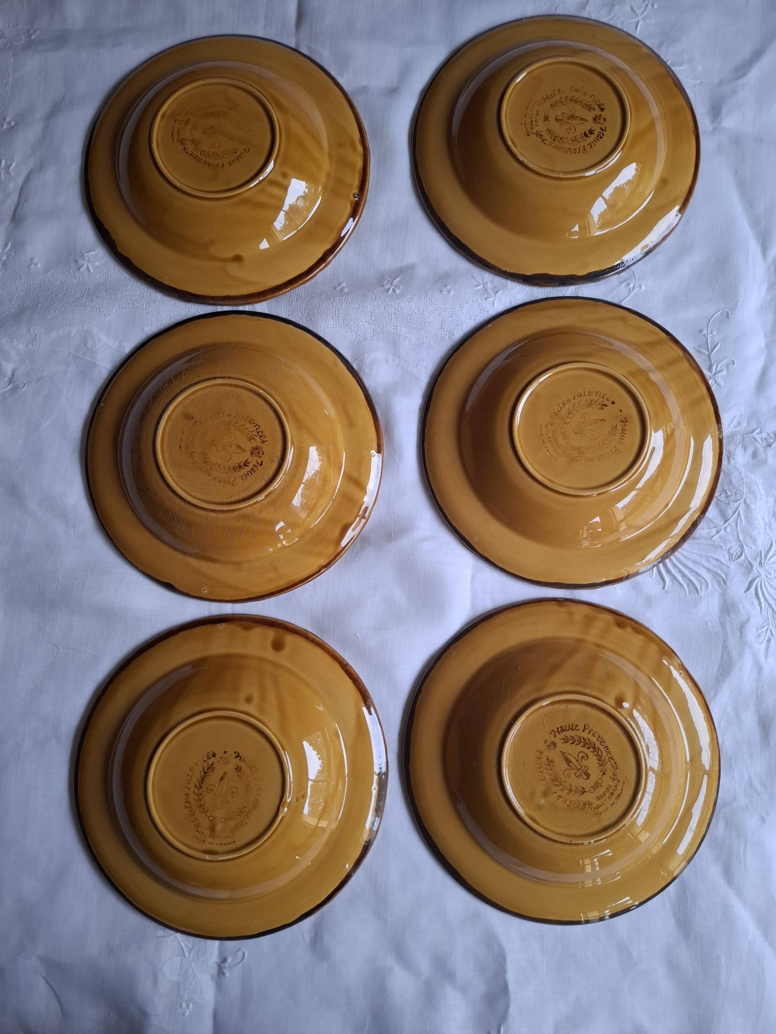 6 ochre deep plates from the Faïencerie de Haute Provence.
