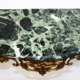 Bronze wall console and mirror.