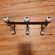 Old iron and porcelain coat hooks
