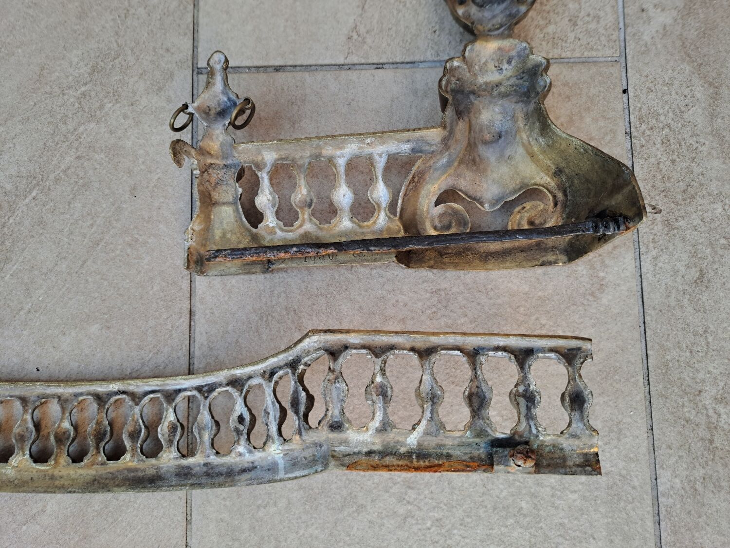 Louis XVI style bronze andirons and fireplace bar