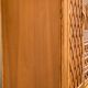 Rattan wardrobe with tapered legs from the 1960s.