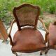 Cane and leather armchair in Louis XV style