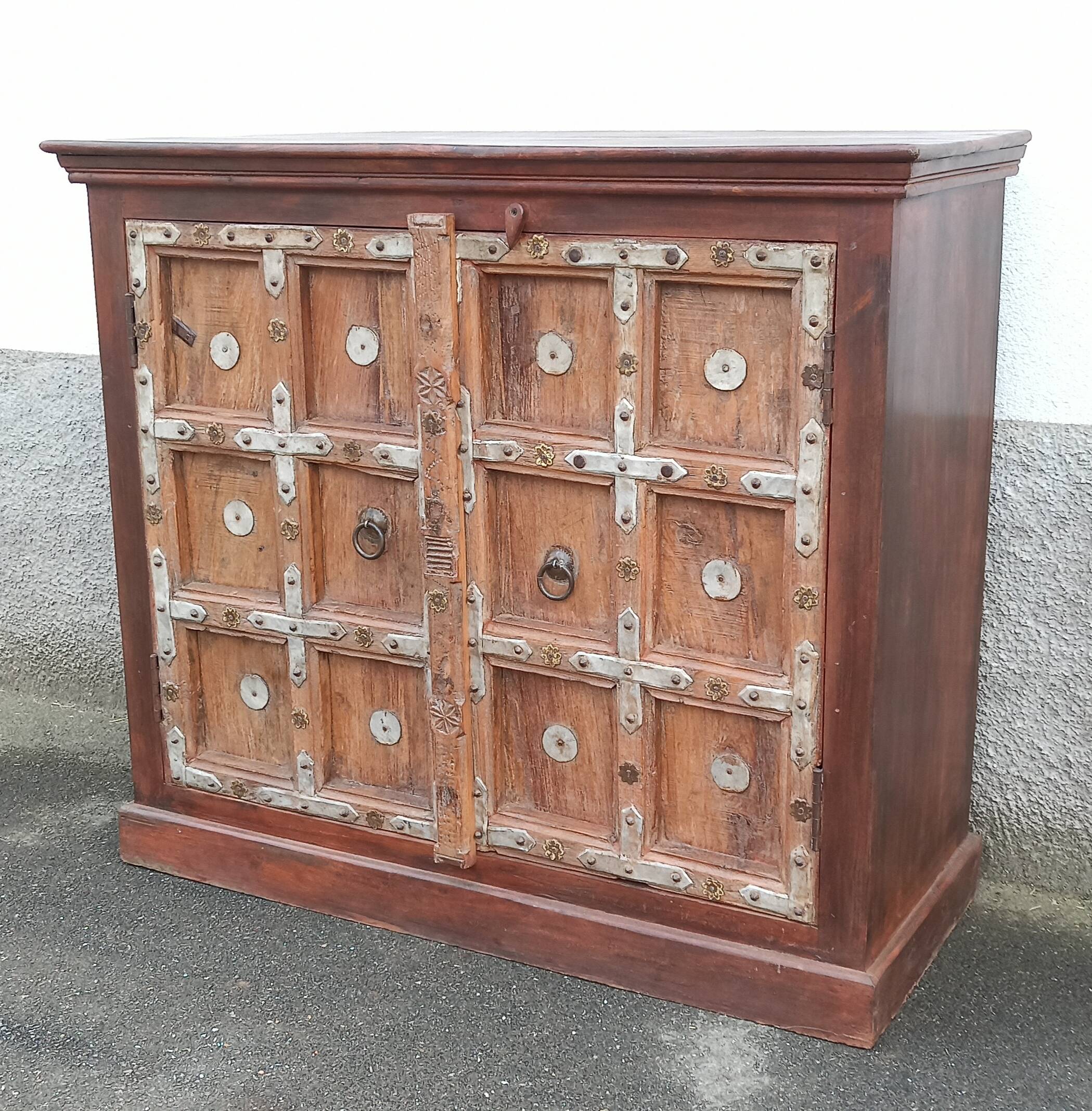 Small old wooden sideboard with two doors
