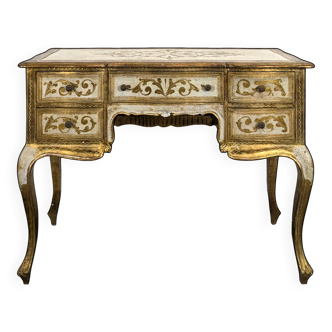 Venetian desk in patinated gilded wood