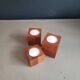 Vintage teak candlestick trio