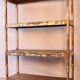 Old workshop shelf in Burmese teak with original teak - cream patina.