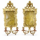 Pair of Napoleon III wall sconces in gilded bronze, with bevelled mirrors.