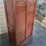 Double curtain binder in blond mahogany