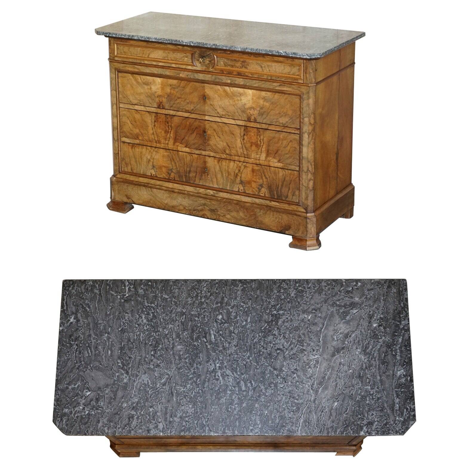 Antique walnut commode from 1860 with a marble top and original key.