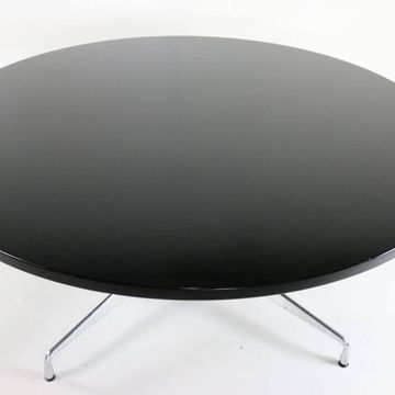 Segmented round table by Charles & Ray Eames