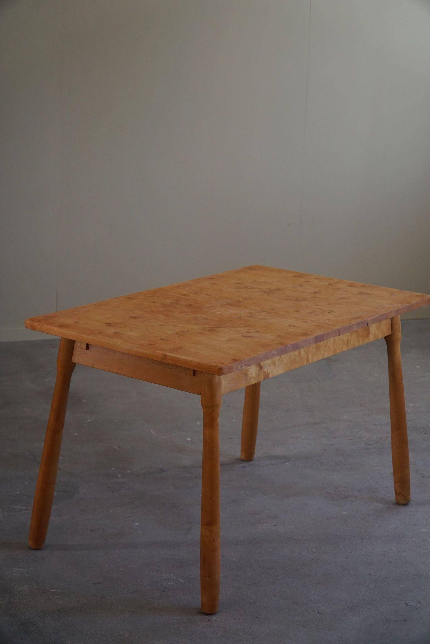 Modern Danish birch desk/dining table attributed to Philip Arctander, 1940s.