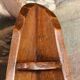 Small brutalist corner shelf in solid oak.