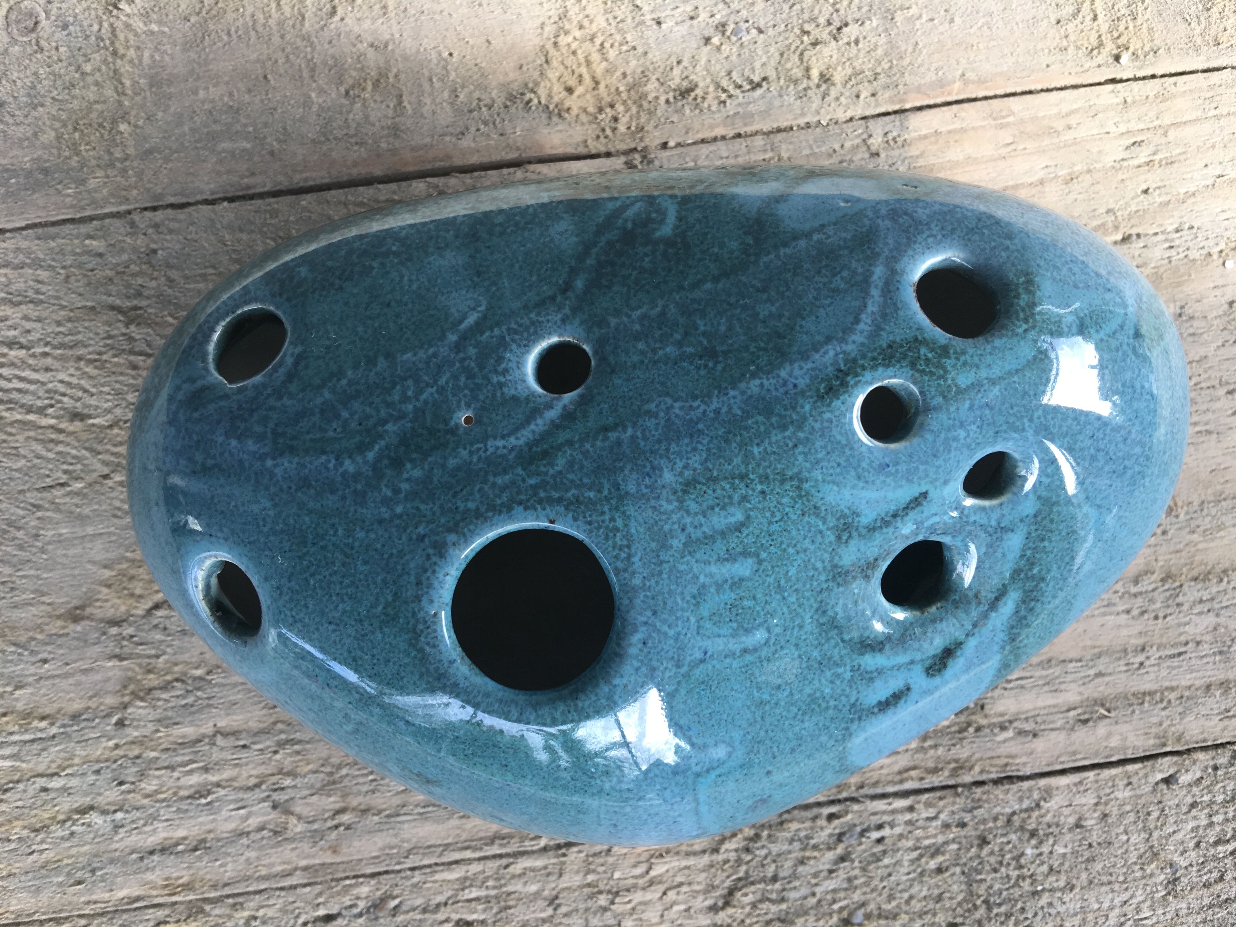 Roller spike flowers, blue-green ceramics