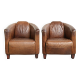 Set of two vintage cowhide Aviator design armchairs in grained leather