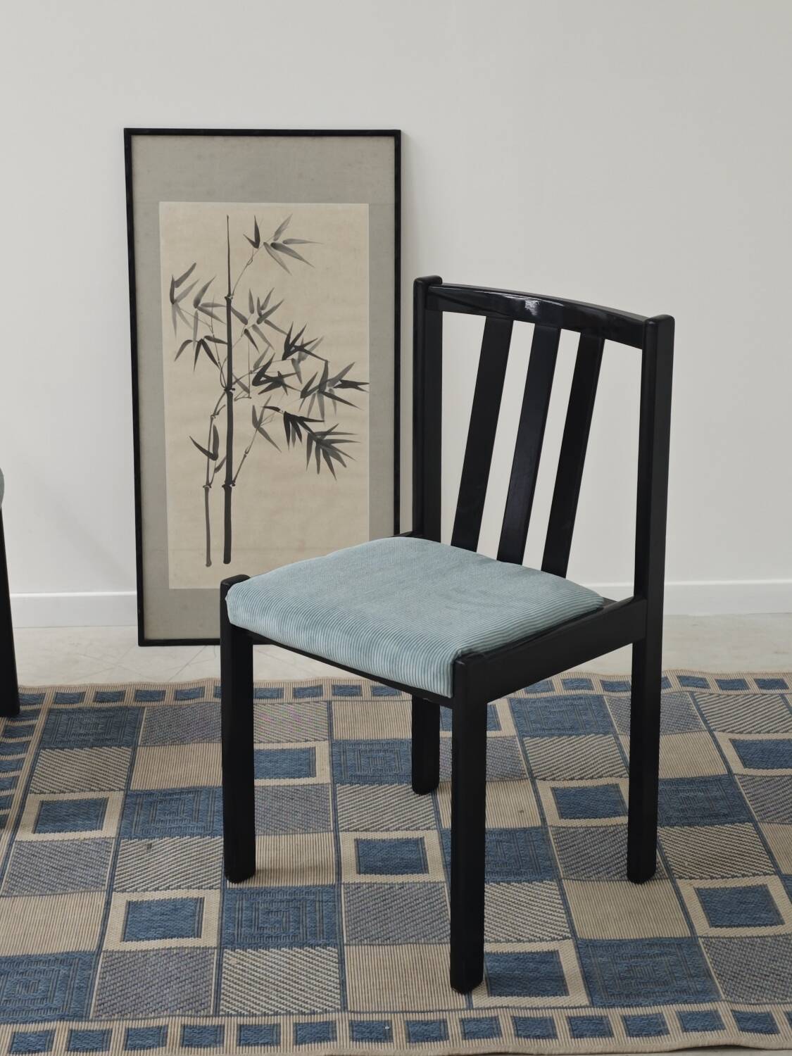 Set of 4 modernist black chairs with light blue ribbed fabric