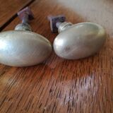 pair of old brass button handles