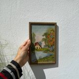 Small landscape painting with golden frame
