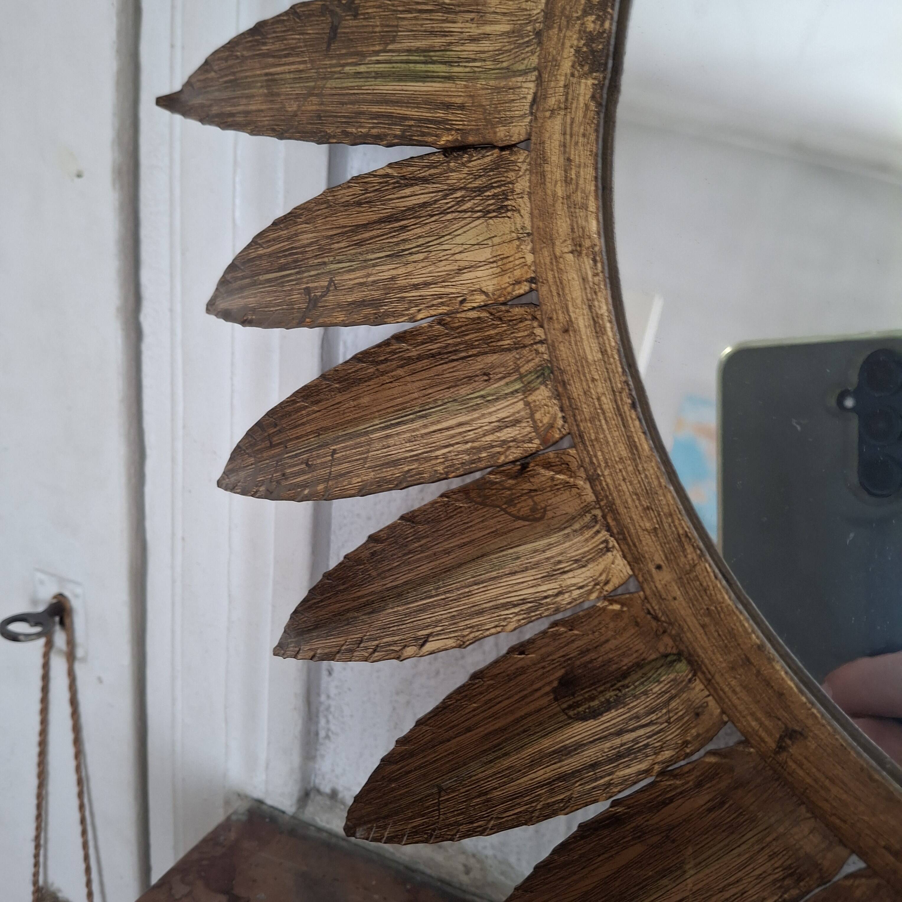 Large sun mirror in gilded metal. 1960