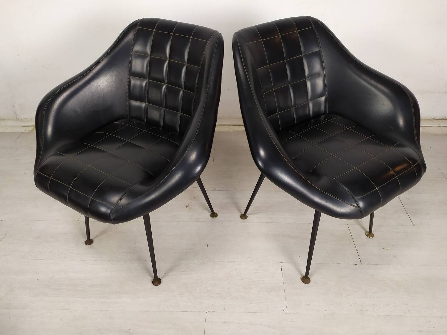 Vintage black skai armchairs