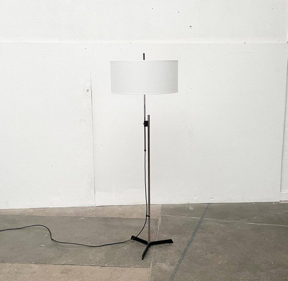 Mid-century German minimalist tripod floor lamp from the 1960s.