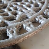 Dessous de plat en fonte