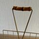 Magazine rack in gold metal and bamboo from the 60s