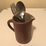 Small pitcher in patinated sandstone