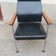 Fauteuil vintage cuir et teck