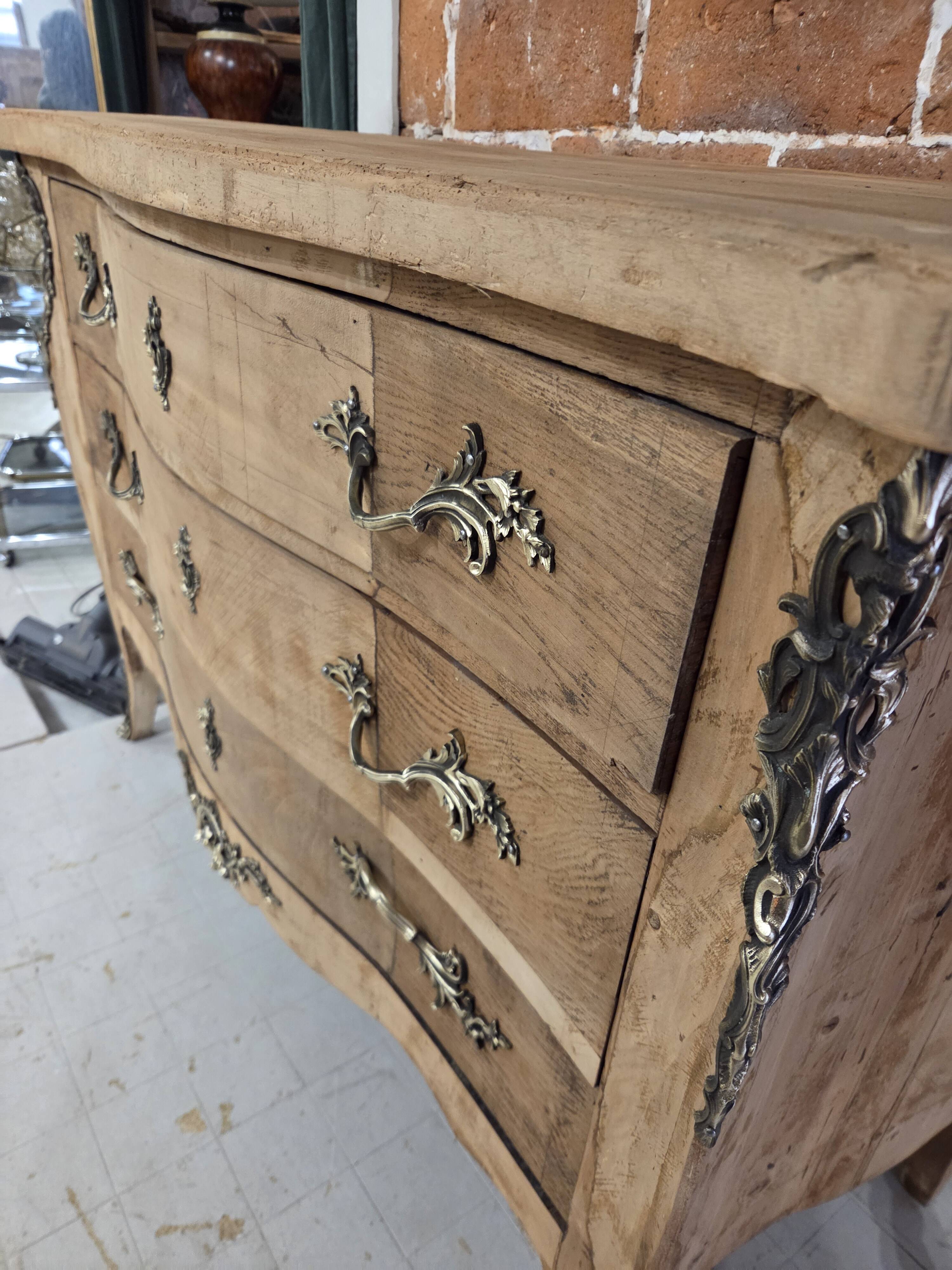 Stripped chest of drawers with bronze handles
