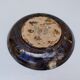 Decorative plate, glazed ceramic, floral design.