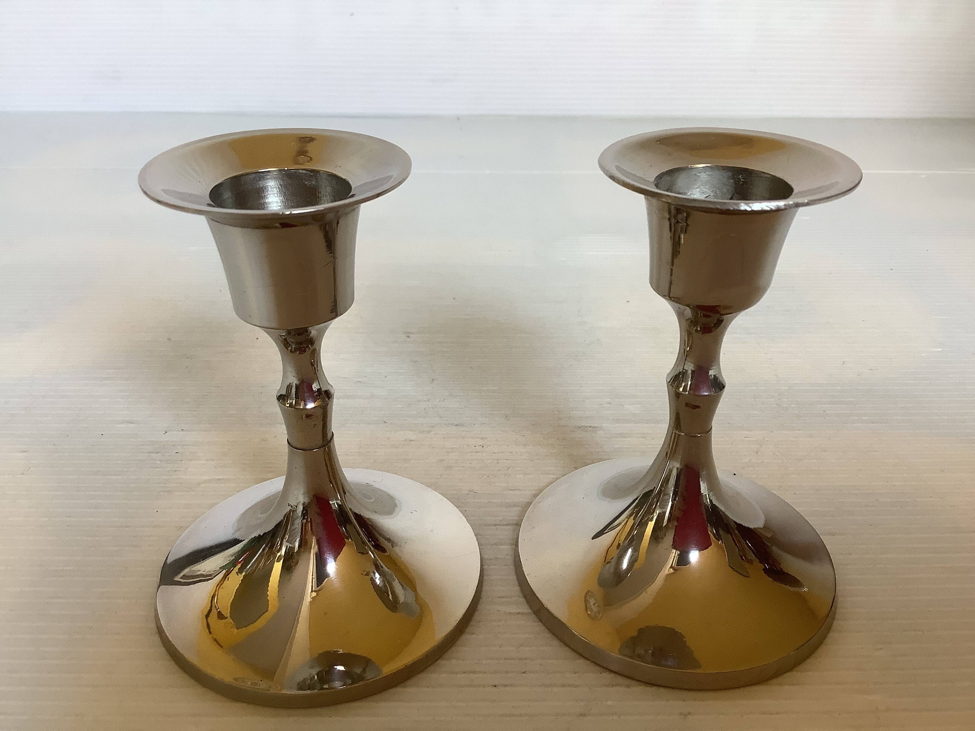 Pair of small silver metal tulip foot candle holders