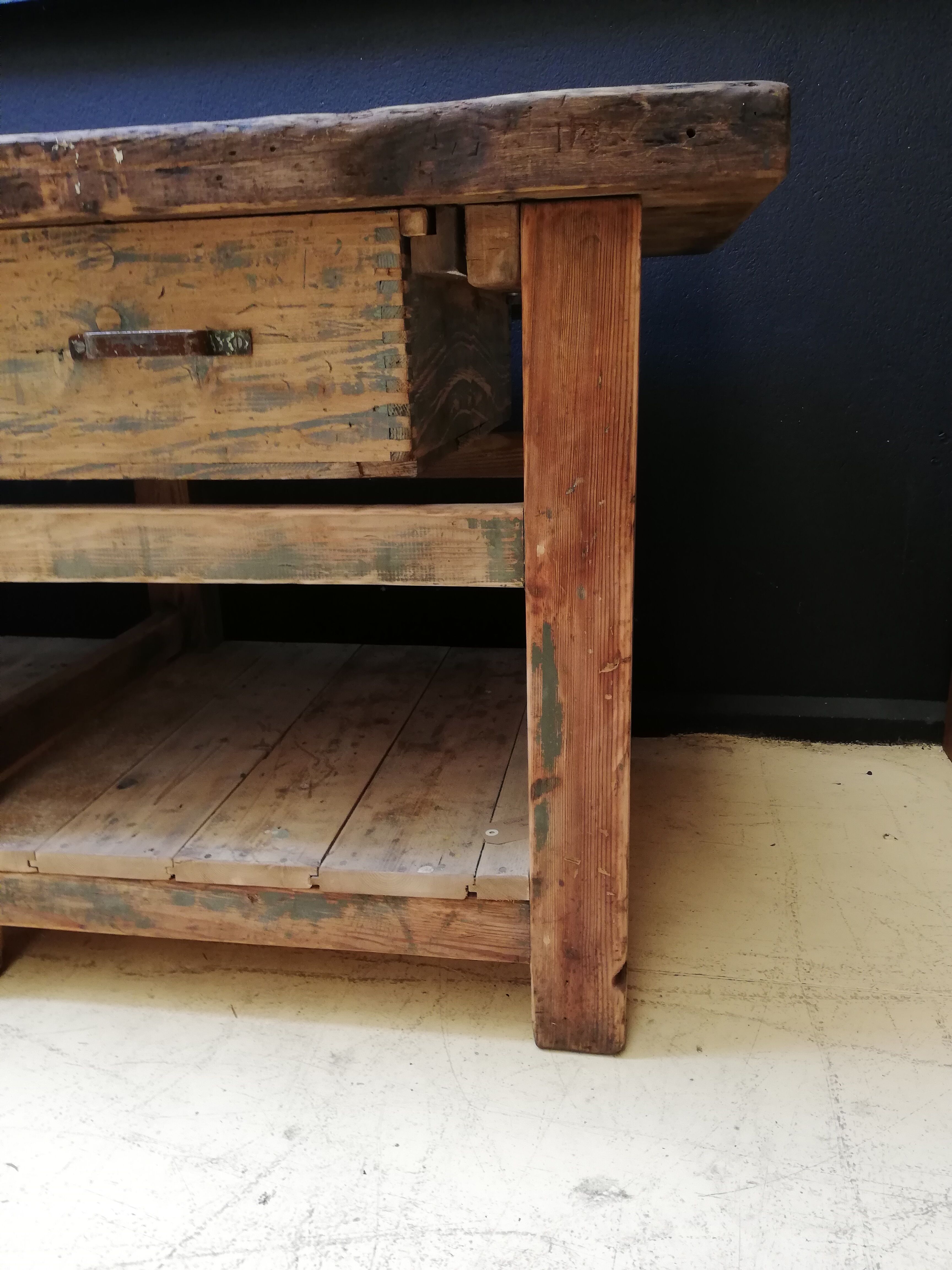 Old vintage wooden carpenter's workbench, industrial decoration