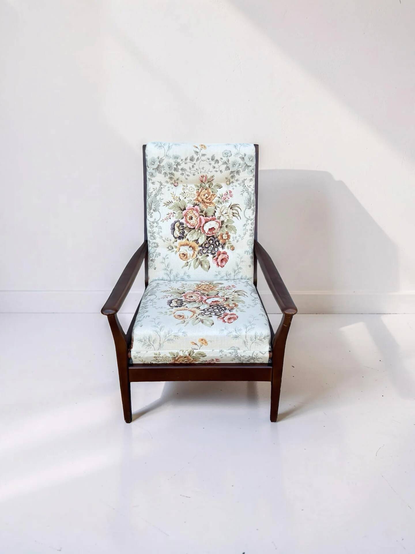 Vintage teak armchair with floral upholstery