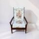 Vintage teak armchair with floral upholstery