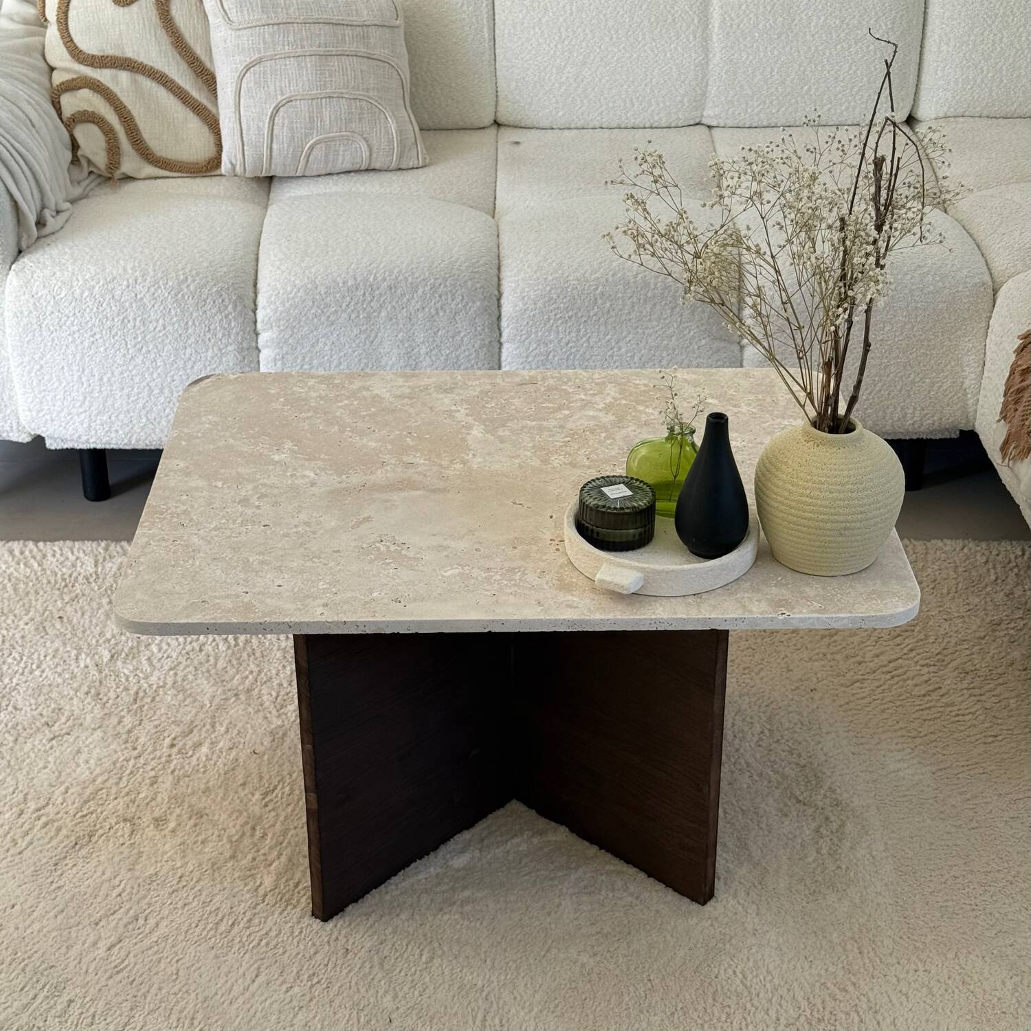 Rectangular coffee table in travertine and dark oak.