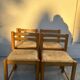 4 vintage chairs made of solid wood and woven straw