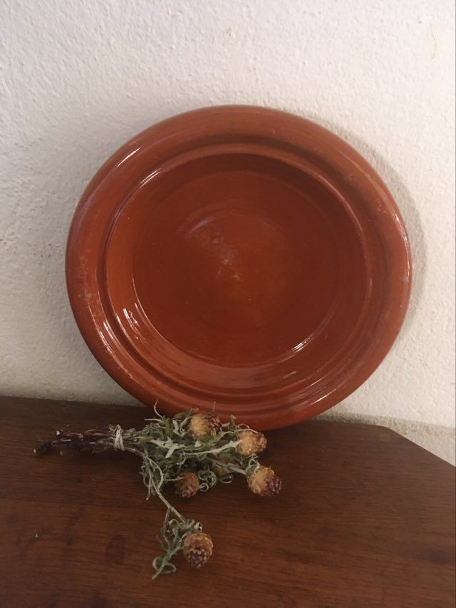 Glazed terracotta dish.