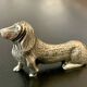 12 old dog-shaped Etains du Manoir knife holders